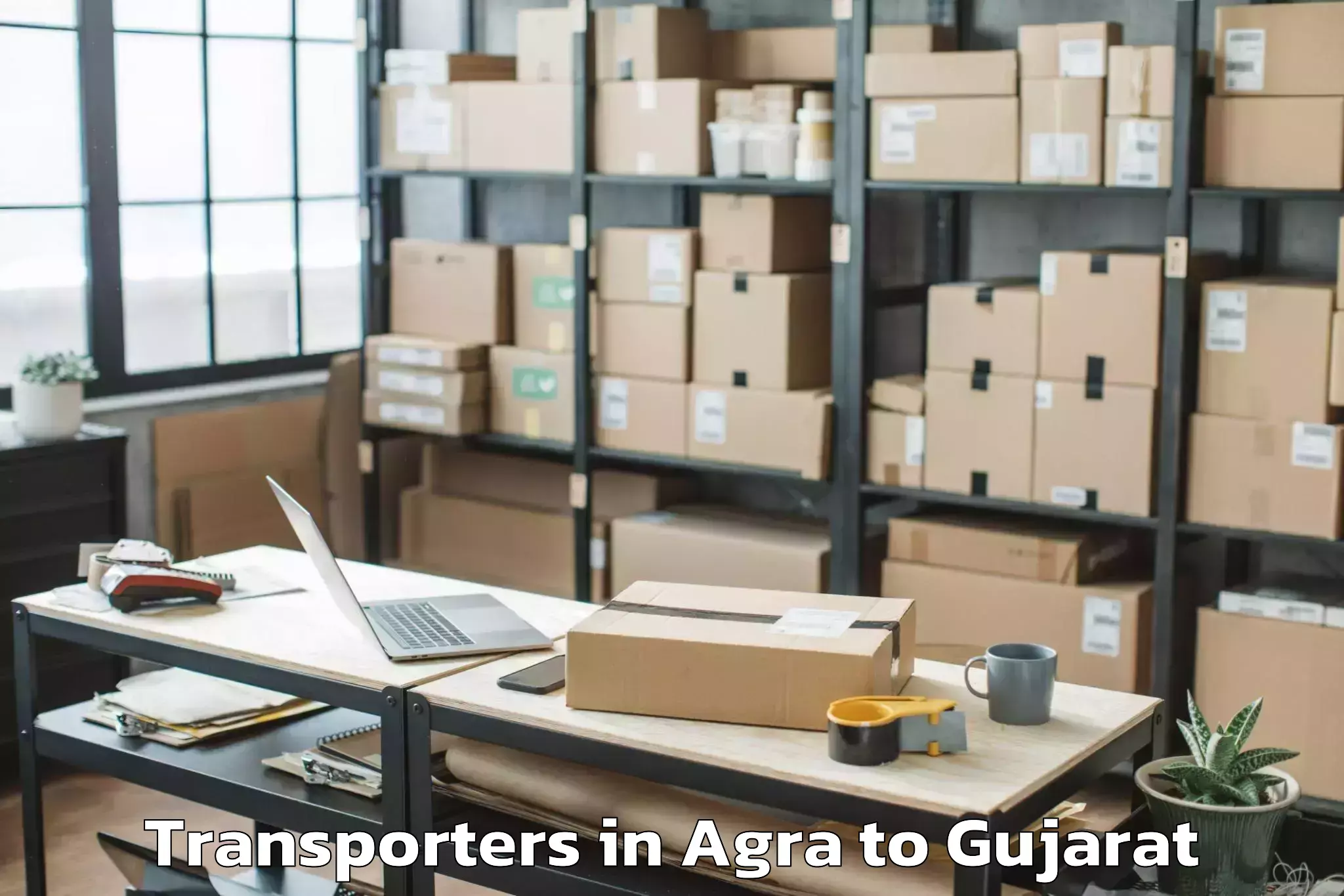 Top Agra to Sagbara Transporters Available